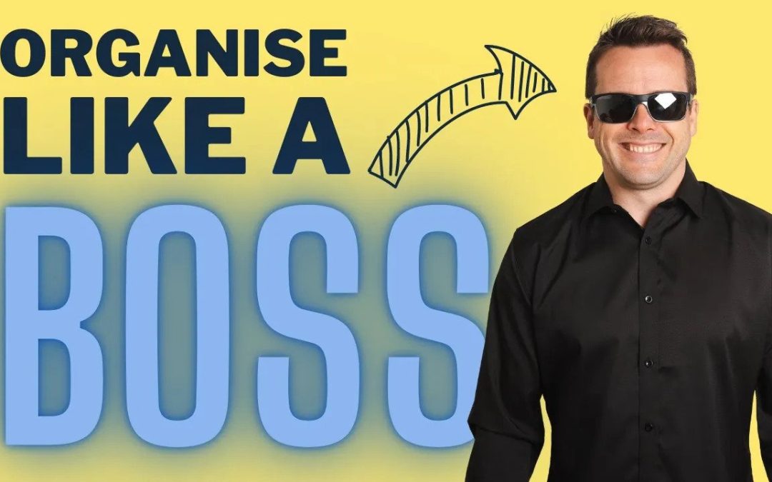 David Jenyns wearing sunglasses and black shirt with 'Organise Like a Boss' text on yellow background