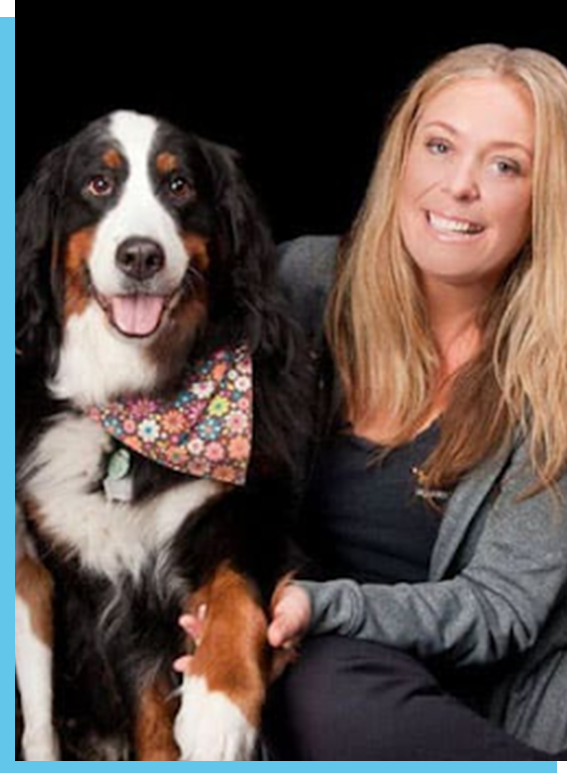 Jeanette Farren with a Bernese Mountain Dog at DiggiddyDoggyDaycare