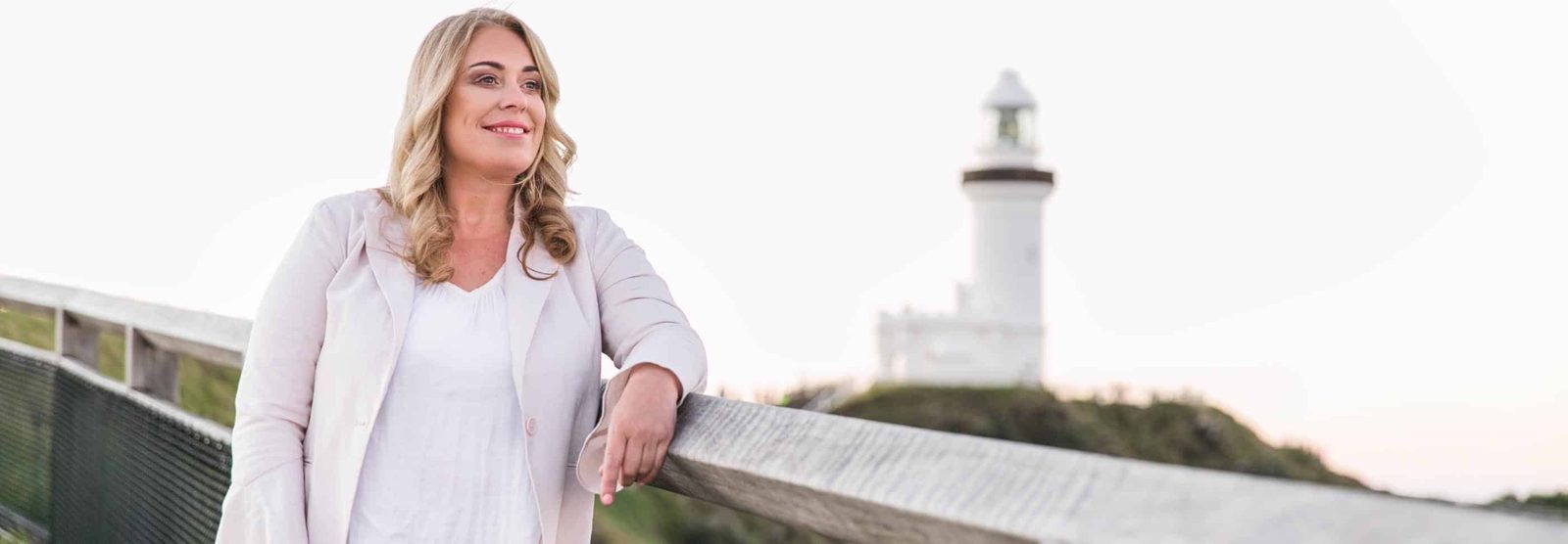 Jeanette Farren beside the lighthouse that gave her advisory practice, Lighthouse for Business, its name